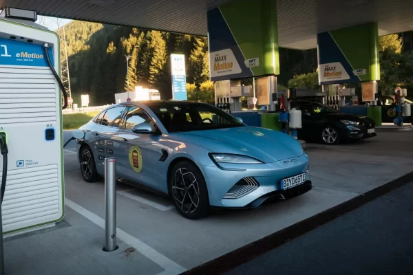 Rows of EU-funded DC fast chargers being installed across Europe.