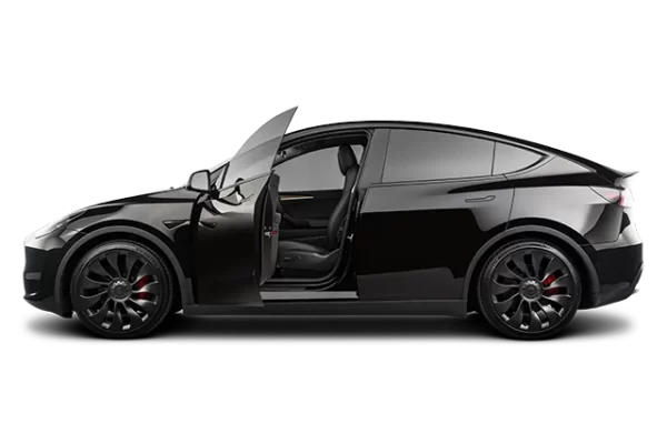 2026 Tesla Model Y Performance "Juniper" on road during first drive review.