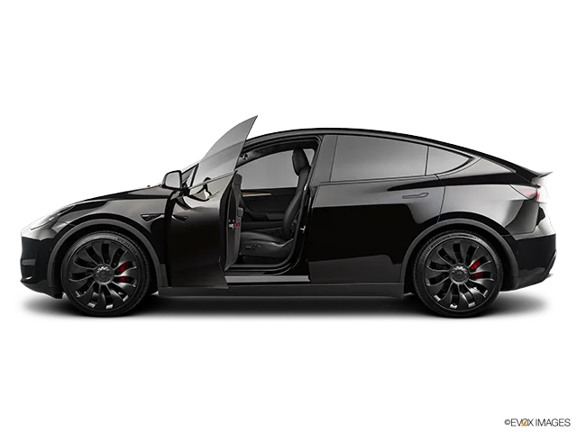 2026 Tesla Model Y Performance "Juniper" on road during first drive review.