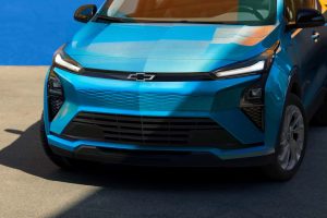 A 2027 Chevy Bolt charging at a Tesla Supercharger using its native NACS port.