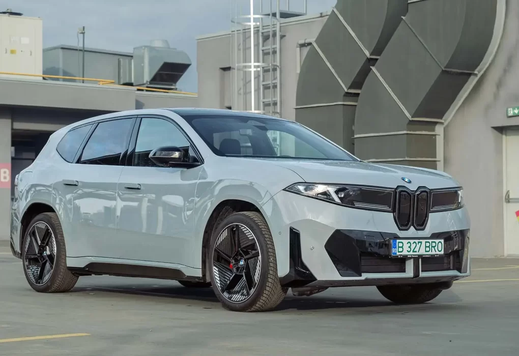 The 2026 BMW iX3 at a high-power charging station during a road trip