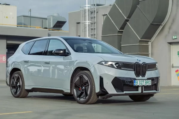 The 2026 BMW iX3 at a high-power charging station during a road trip