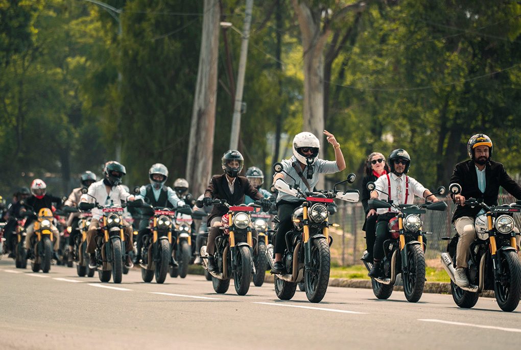Dapper riders on classic Triumph and Royal Enfield motorcycles parading through Kathmandu for DGR 2026.