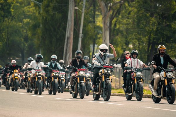 Dapper riders on classic Triumph and Royal Enfield motorcycles parading through Kathmandu for DGR 2026.