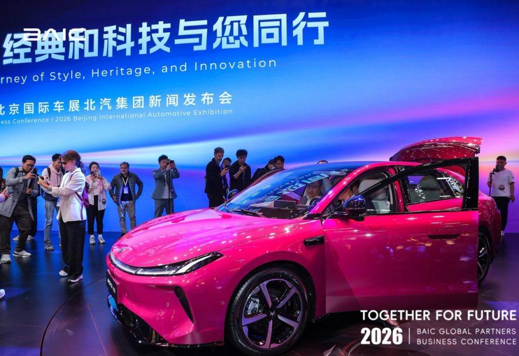 Lokesh Oli (Bijulidai) being photographed by international media at Auto China 2026