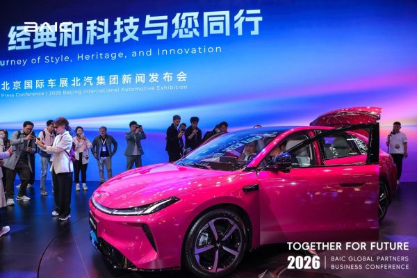 Lokesh Oli (Bijulidai) being photographed by international media at Auto China 2026