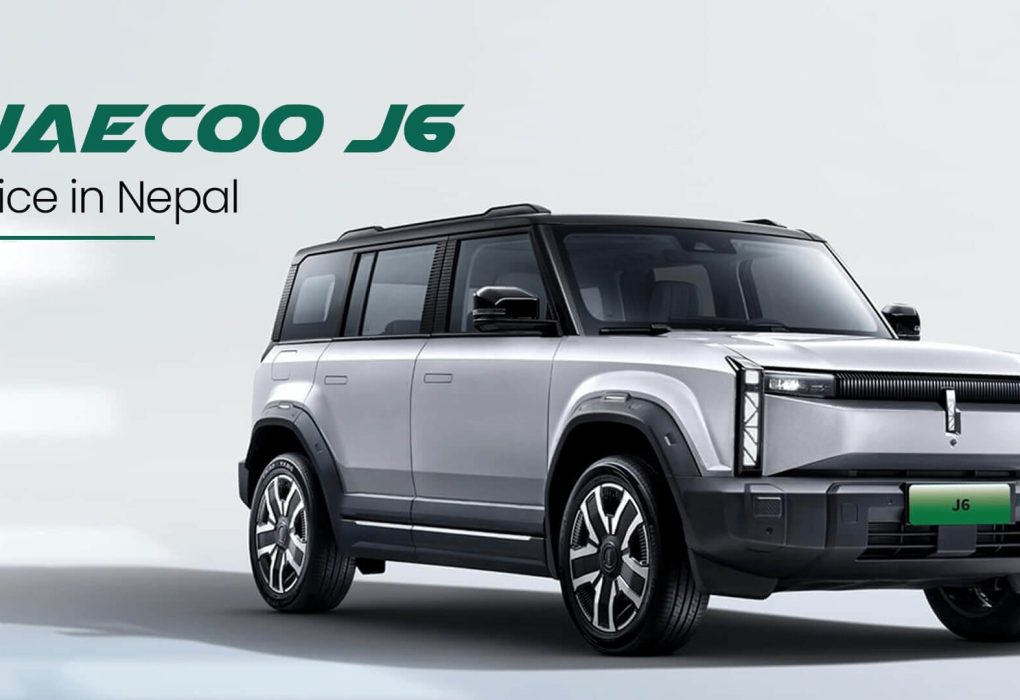 The rugged front profile of the green Jaecoo J6T electric SUV showing its vertical matrix LED lighting and high 225mm stance.